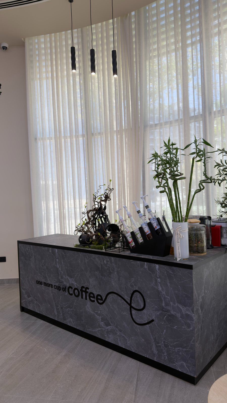 Coffee bar with marble counter at Haitham Labban Beauty Salon, Manama